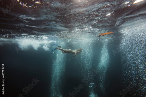 Woman underwater, Gili Meno, Gili islands, Bali, Indonesia photo