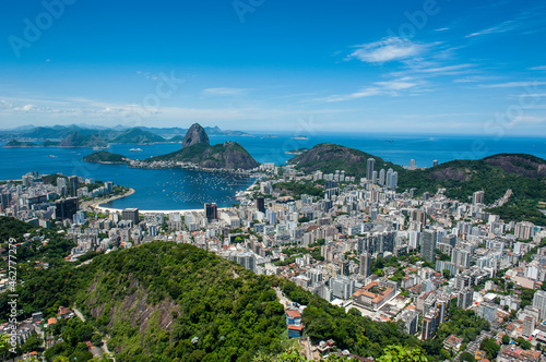 Outlook from the Christ the Redeemer statue over Rio de Janeiro with Sugarloaf Mountain, Brazil