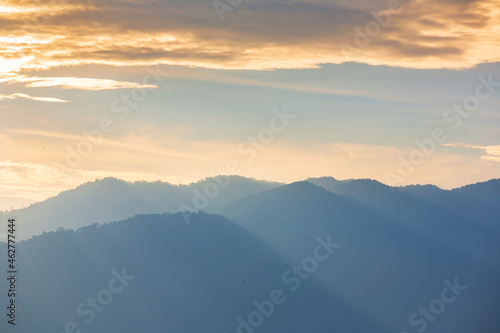 Dramatic sunset over the mountains in the eastern part of Thailand © isarescheewin