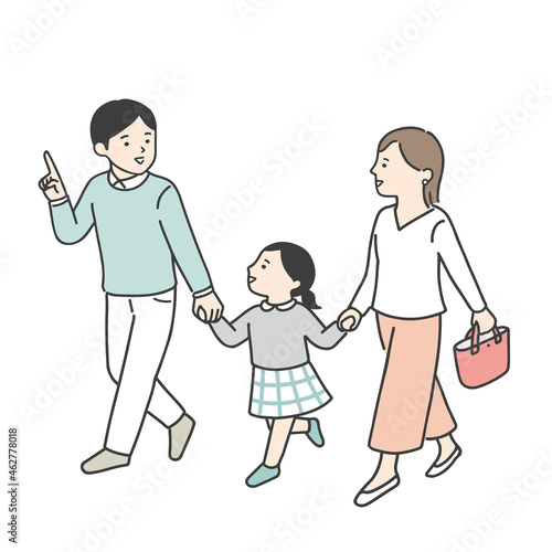 手を繋いで歩く三人親子