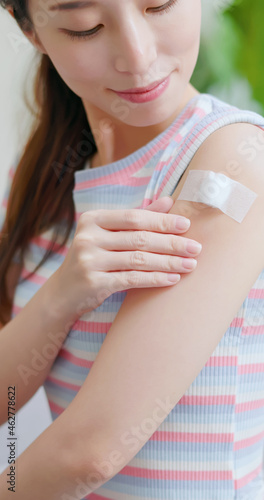 woman has inject vaccine photo