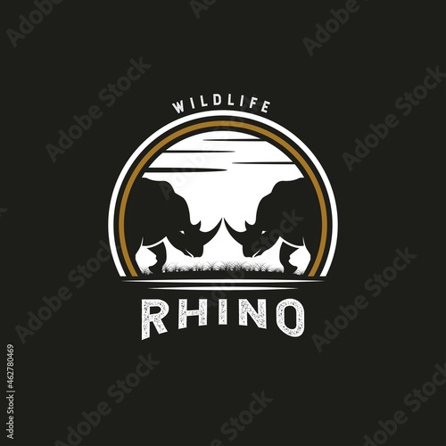 Vintage Rhino Logo. With rhinoceros, and grass icon. Premium, luxury, black, and gold logo design