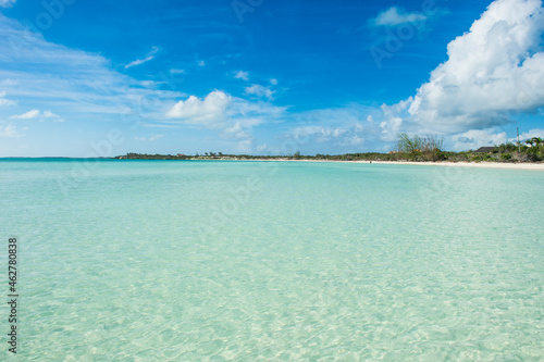 Scenic view of Taylor beach against blue sky during sunny day, Providenciales, Turks And Caicos Islands photo