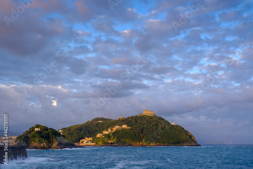 Spain, Gipuzkoa, San Sebastian, Clouds overÔøΩMonte Igueldo at dusk photo