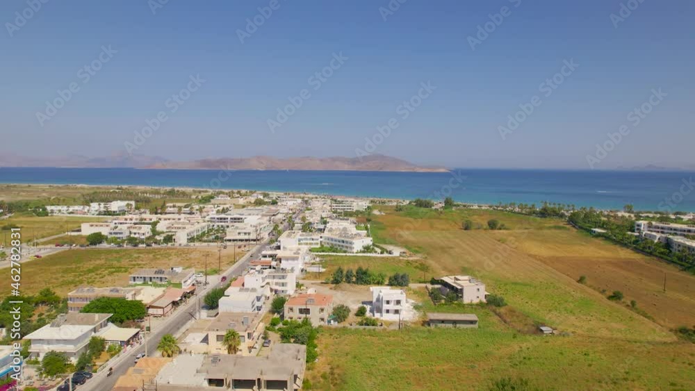 Aerial view over Tigaki town approaching beach, Kos, Greece Aerial view over Tigaki town approaching beach, Kos, Greece