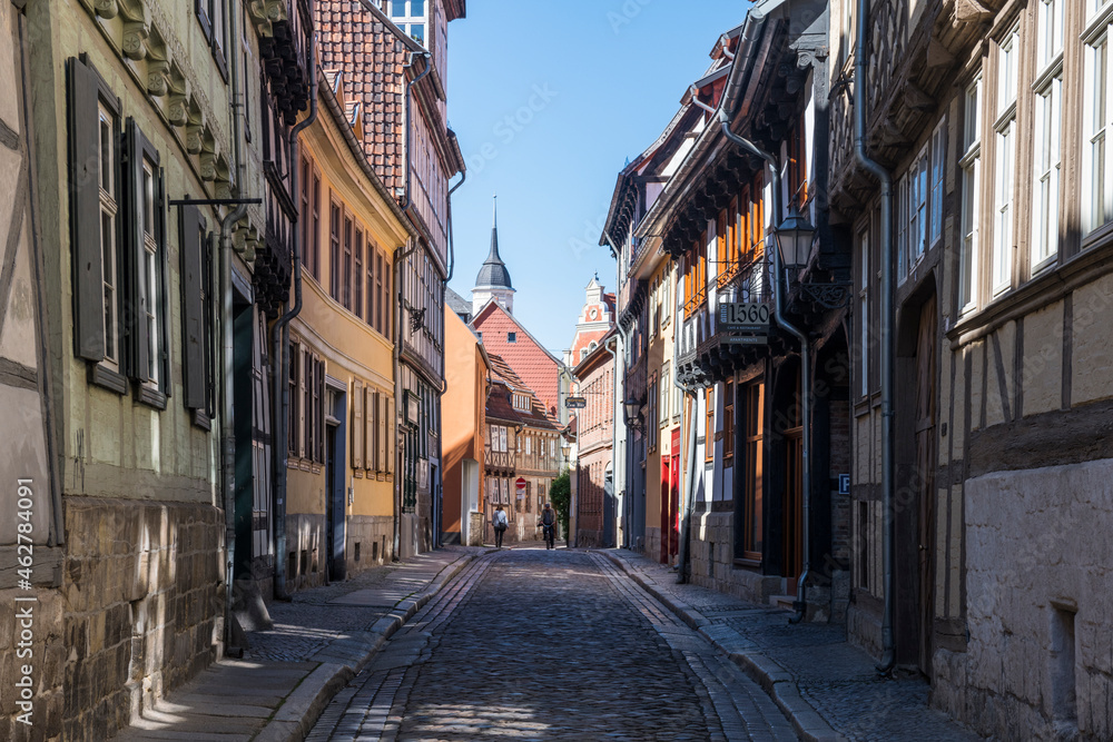 Germany, Saxony-Anhalt, Quedlinburg, Cobblestone alley betweenÔøΩhouses of historical town Germany, Saxony-Anhalt, Quedlinburg, Cobblestone alley betweenÔøΩhouses of historical town