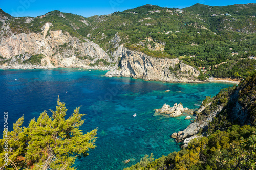 Tranquil view of sea and mountains during sunny day in Paleokastritsa, Corfu, Ionian Islands photo