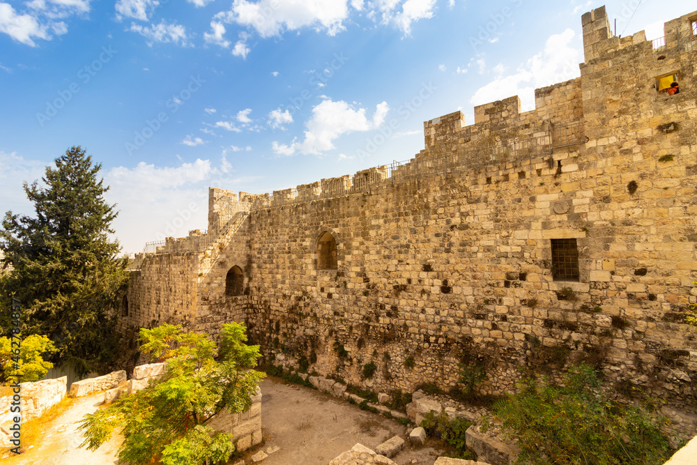 jerusalem-israel. 13-10-2021. The famous and ancient walls around the Old City and the Jewish Quarter in Jerusalem, against a background of blue skies