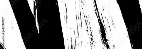 Black and white grunge background. Smears of black paint on white. The abstract backdrop is monochrome. Psychedelic Image