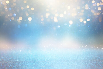glitter vintage lights background. silver, blue, gold and white. de-focused