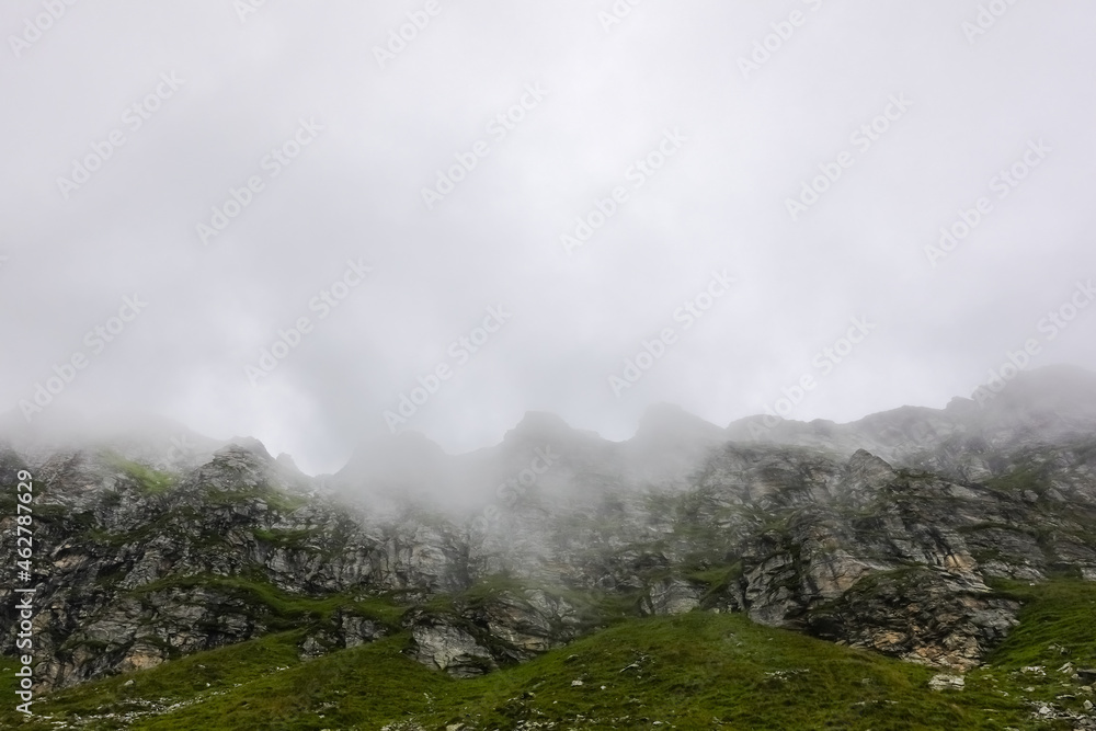 fog over many peaks from a mountain range fog over many peaks from a mountain range