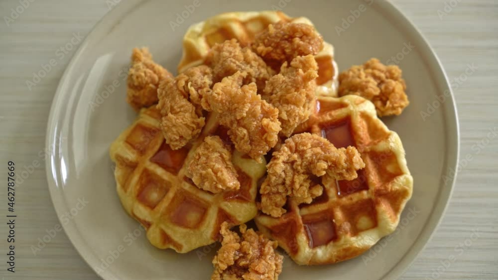 homemade fried chicken waffle with honey or maple syrup homemade fried chicken waffle with honey or maple syrup