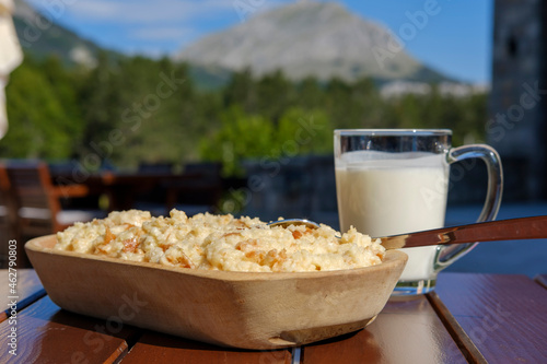Montenegro, Popara with milk on wooden table photo