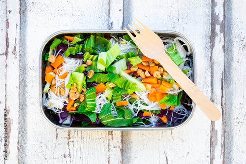 Lunch box, glass noodle salad with pak choi, carrot, red cabbage and photo