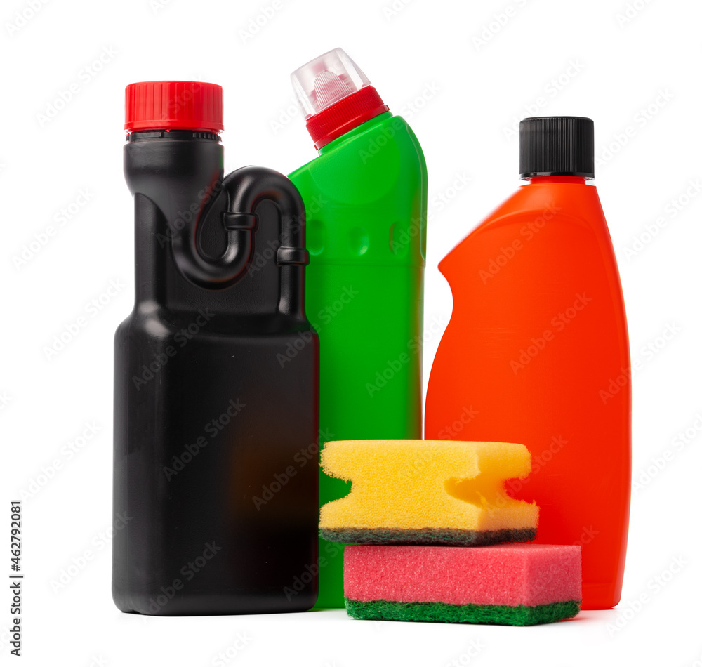 Bottles with cleaning products and sponge on a white isolated background