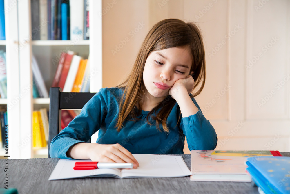 Frustrated girl with homework Frustrated girl with homework
