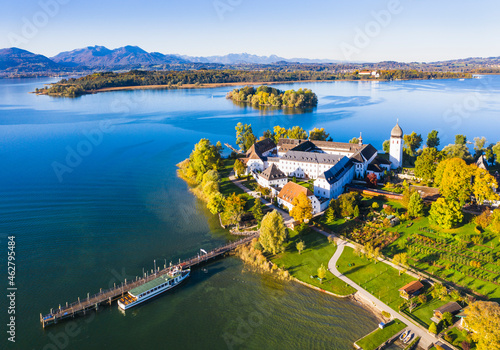 Germany, Bavaria, Aerial view of pier and monastery on Frauenchiemsee islet photo