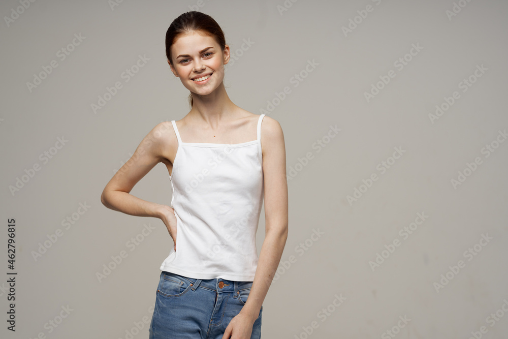 cheerful woman pulls herself up in a health jersey cheerful woman pulls herself up in a health jersey