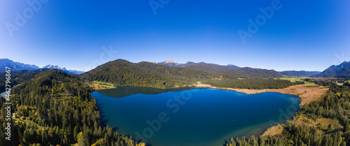 Germany, Bavaria, Krun, Drone view of clear blue sky over Barmsee lake
