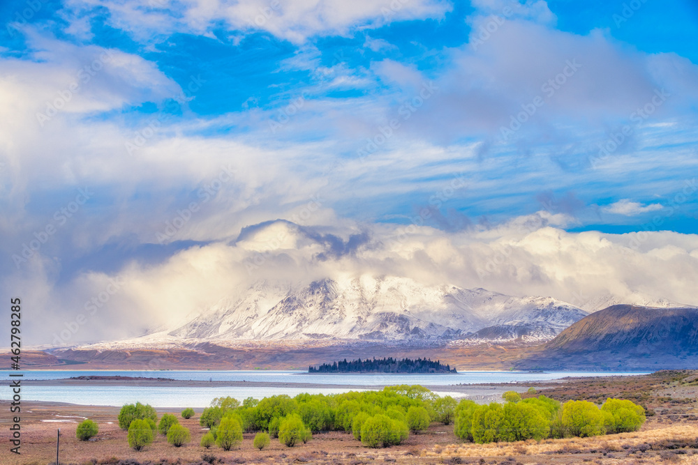 Scenic view of Lake Tekapo against snowcapped Mount Dobson, South Island, New Zealand Scenic view of Lake Tekapo against snowcapped Mount Dobson, South Island, New Zealand