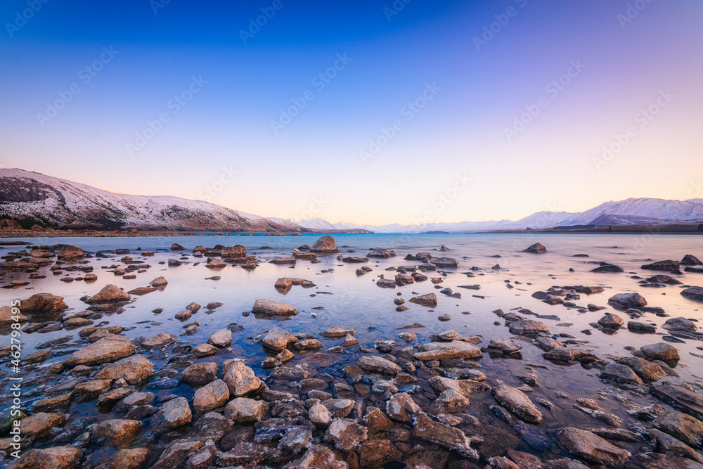 Scenic view of Lake Tekapo against sky during sunset, South Island, New Zealand Scenic view of Lake Tekapo against sky during sunset, South Island, New Zealand