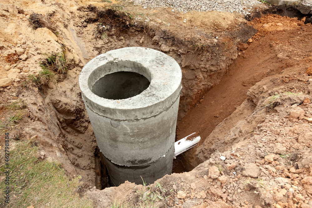 Installation of underground tank for sewage system. Installation of underground tank for sewage system.
