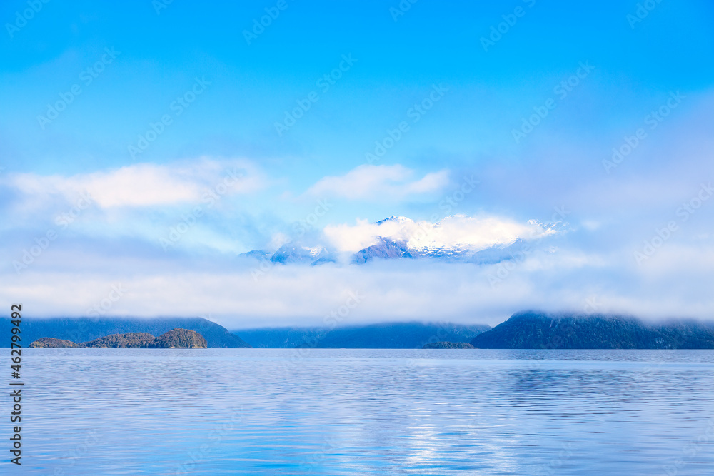 Scenic view of Lake Manapouri against sky at Te Anau, South Island, New Zealand Scenic view of Lake Manapouri against sky at Te Anau, South Island, New Zealand
