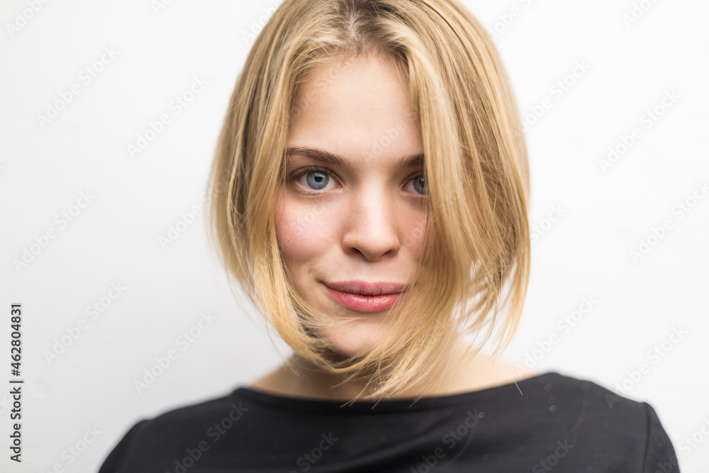 Portrait of blond young woman with bob hairdo Portrait of blond young woman with bob hairdo