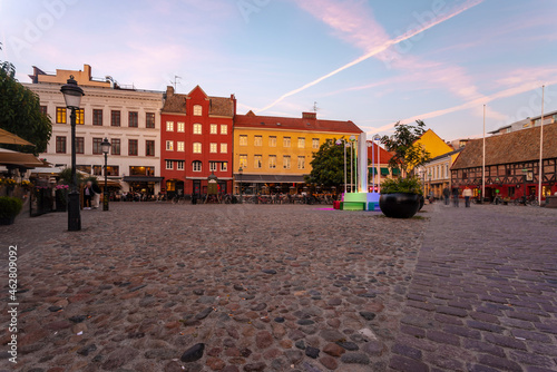 Buildings at city square against sky during sunset in Malmo, Sweden photo