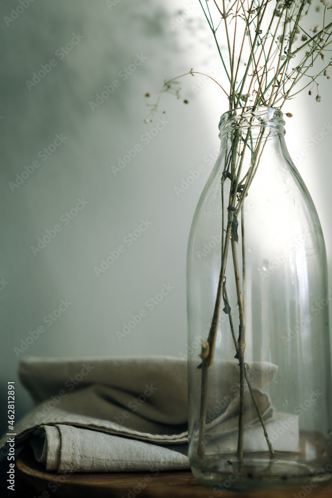 Old vintage bottle with flowers