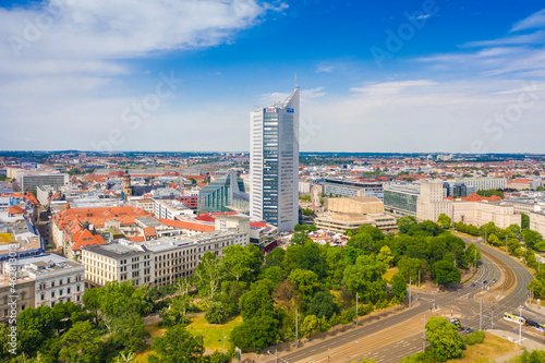 High angle view of City-Hochhaus in Leipzig cityscape against cloudy sky