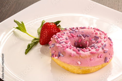 Glaze cundy donut with chocolate photo