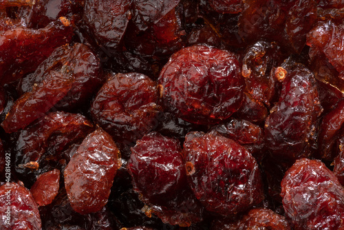 Detailed and large close up shot of dried cranberries.