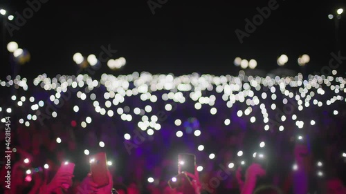 Wallpaper Mural atmosphere of concert out of focus, unrecognizable fans holding mobile phones with flashlights in theirs hands in face of the stage Torontodigital.ca