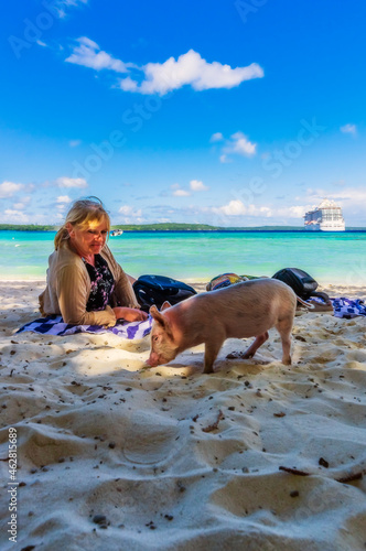 New Caledonia, Lifou, woman and farrow at the beach photo