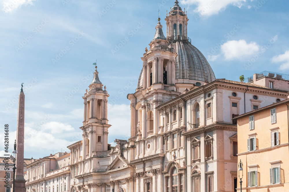 Italy, Rome, Low angle view of Sant Agnese in Agone church with Agonalis obelisk in background Italy, Rome, Low angle view of Sant Agnese in Agone church with Agonalis obelisk in background