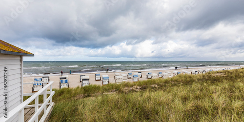 Germany, Mecklenburg-West Pomerania, Kuehlungsborn, Resort beach and sea on cloudy day photo