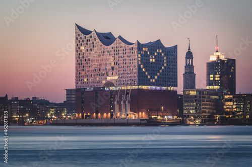 Germany, Hamburg, Heart shape displayed on Elbphilharmonie at dusk photo