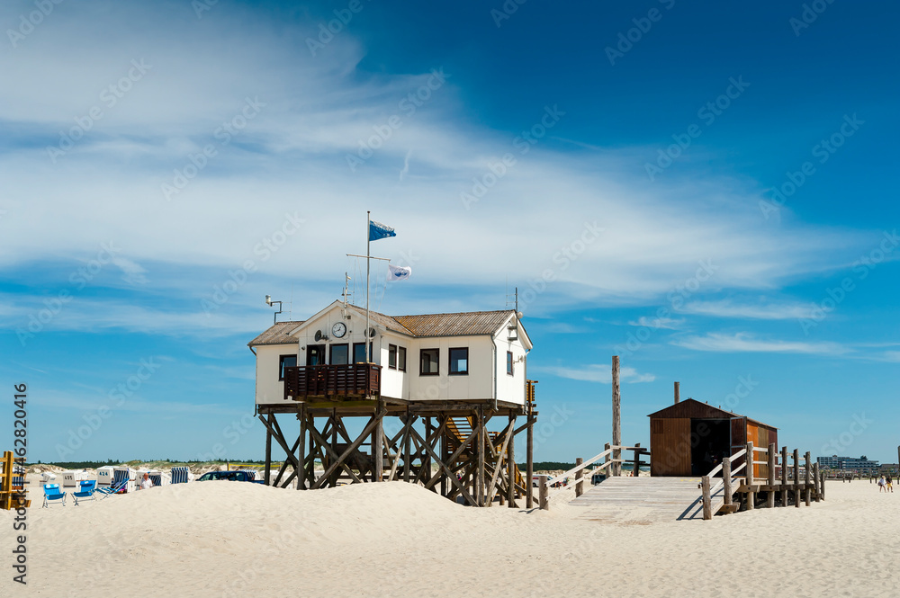 Germany, Schleswig-Holstein, Sankt Peter-Ording, beach with stilt houses Germany, Schleswig-Holstein, Sankt Peter-Ording, beach with stilt houses