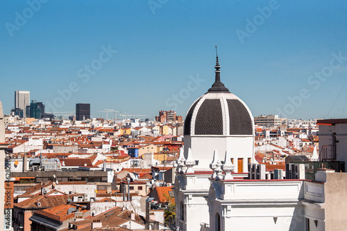 Roofs of houses in Madrid, near Paseo de la Castellana photo