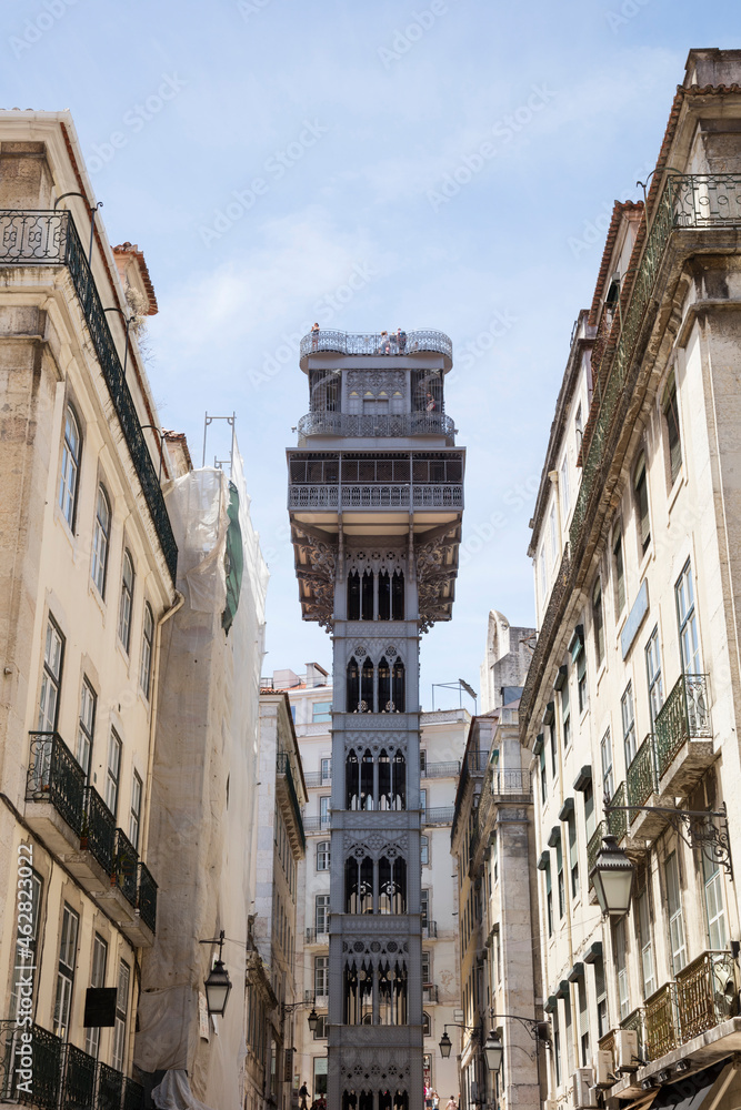 Low angle view of Santa Justa Elevator and buildings against sky, Lisbon, Portugal Low angle view of Santa Justa Elevator and buildings against sky, Lisbon, Portugal