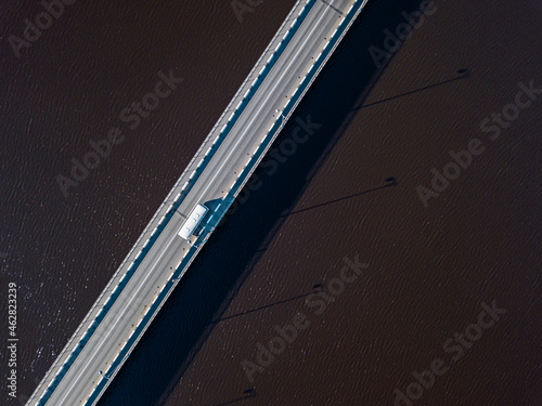 Russia, Republic of Karelia, Sortavala, Aerial view of bridge stretching across Lake Ladoga photo