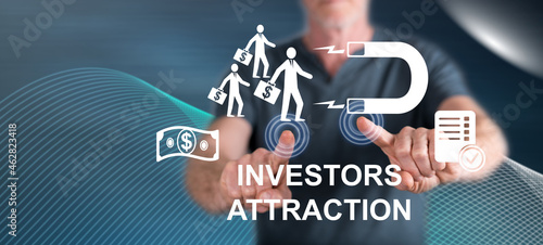 Fotografie Man touching an investors attraction concept