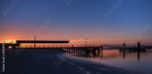 sunset at the pier at Armona Island, Olhao, Portugal photo