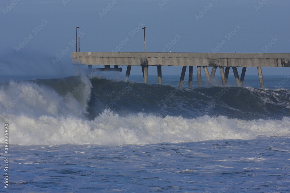 large surf waves at Sharp Park pier. California. USA large surf waves at Sharp Park pier. California. USA