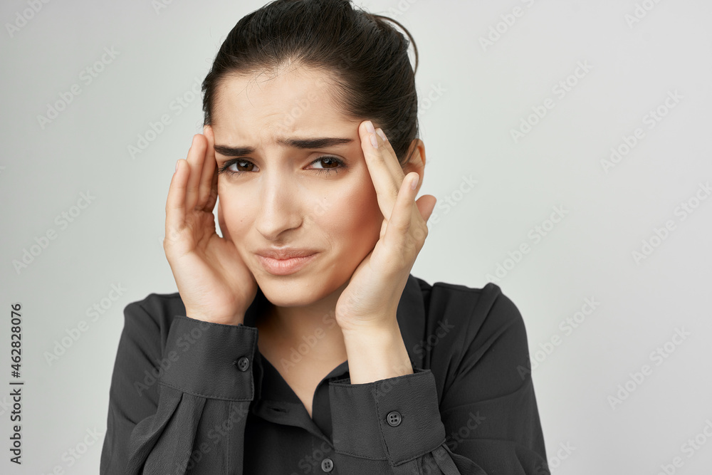 woman in black shirt headache discontent trouble isolated background woman in black shirt headache discontent trouble isolated background