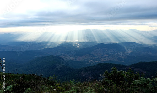 Sunlight shine on the hillside and the plateau, Adventure on the trekking trail, Sunbeam shine through the cloud to the valley and the mountain