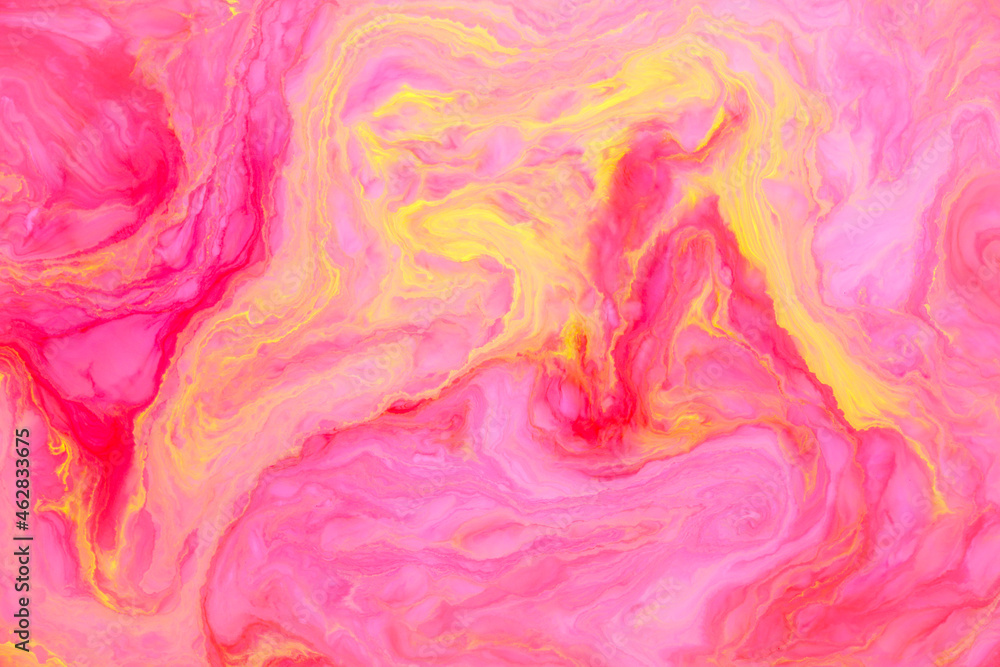 Abstract colored marble background, stains of pink and yellow paint on the surface of the water. Liquid colorful backdrop.