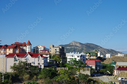 SUDAK, CRIMEA - July, 2020: The street of the city in summer sunny day
