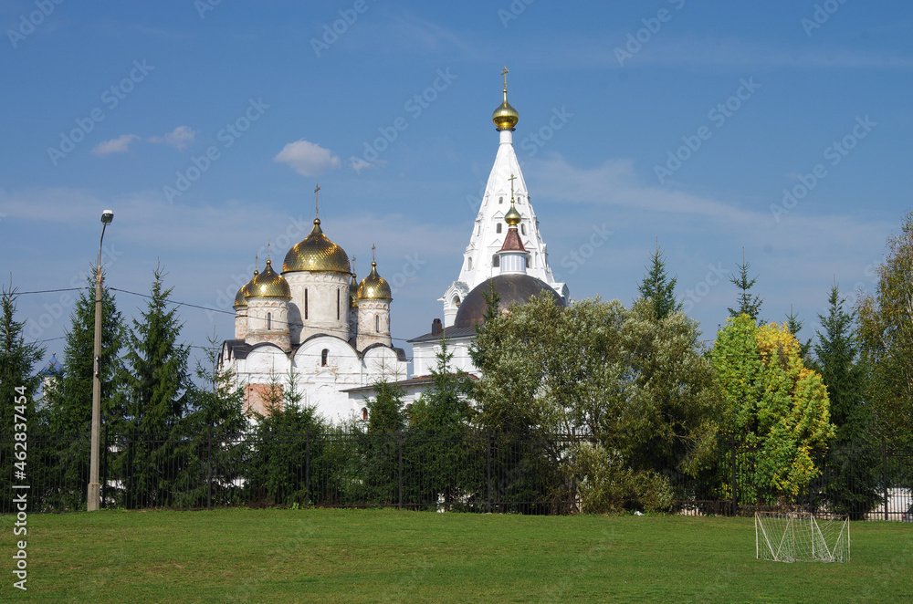 Mozhaisk, Russia - September, 2019: Luzhnetsky Ferapontovsky monastery and football field and gate Mozhaisk, Russia - September, 2019: Luzhnetsky Ferapontovsky monastery and football field and gate